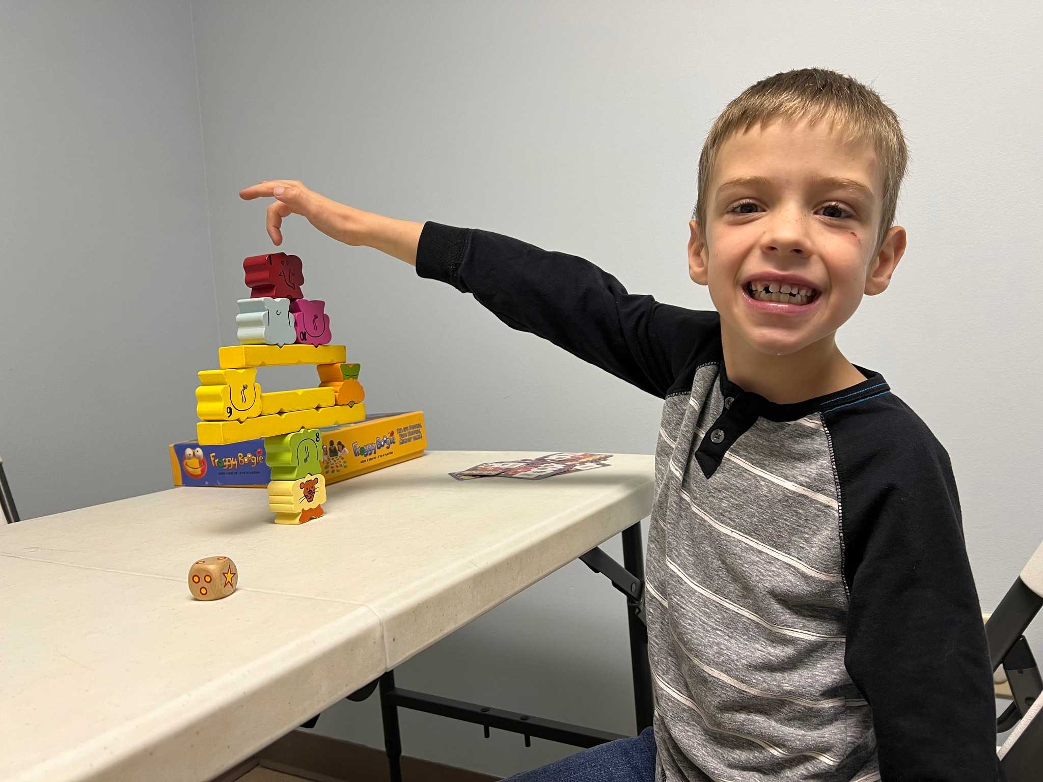 Lindsey posing with a child